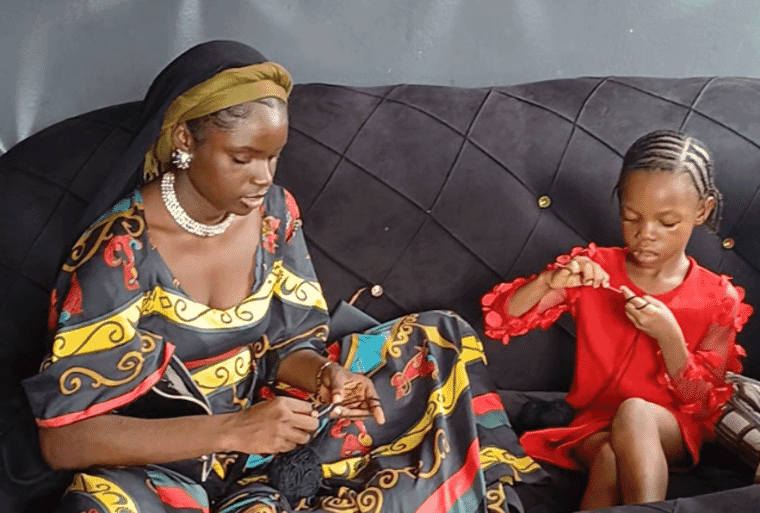 Volunteers mentoring children at a NextGem partner home